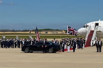 The U.S. Air Force Band and an armed forces full honor cordon perform during an arrival ceremony for their Majesties of the United Kingdom of Great Britain and Northern Ireland.
