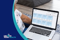 Unlock Your Health logo; Person uses a laptop while sitting on a couch.