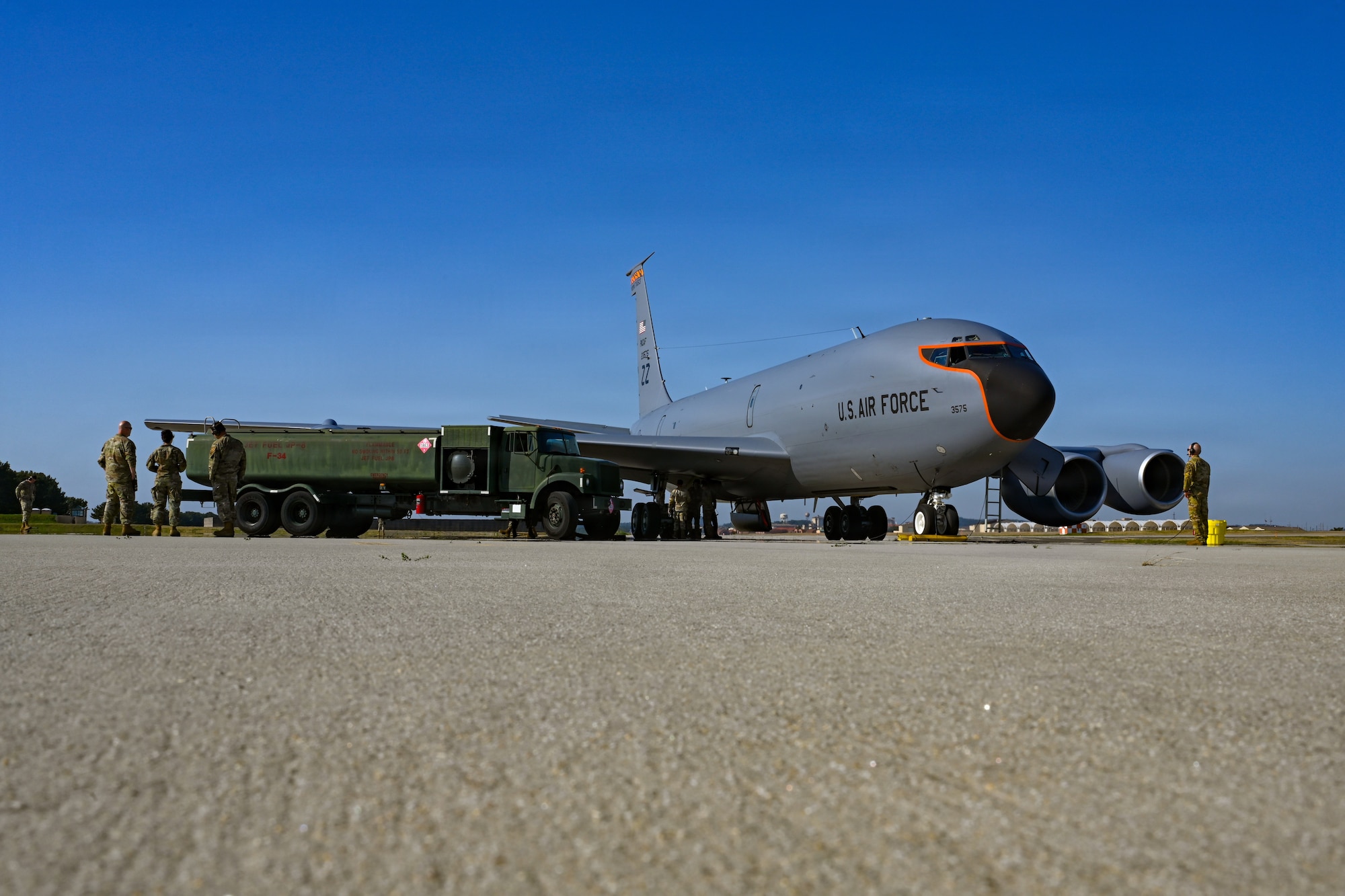U.S. Airmen assigned to the 31st Combat Air Base Squadron hot pit refuel a KC-135 Stratotanker assigned to the 909th Aerial Refueling Squadron during exercise Freedom Flag 26-1 at Kunsan Air Base, Republic of Korea, April 16, 2026. Freedom Flag 26-1 is a routine, defensive training event designed to prepare forces for tactical execution of combat missions. (U.S. Air Force photo by Senior Airman Ty Pilgrim)
