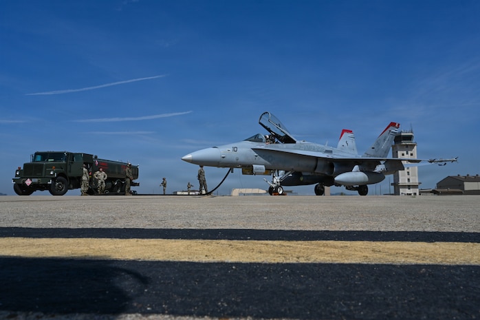 U.S. Airmen assigned to the 31st Combat Air Base Squadron hot pit refuel a KC-135 Stratotanker assigned to the 909th Aerial Refueling Squadron during exercise Freedom Flag 26-1 at Kunsan Air Base, Republic of Korea, April 16, 2026. Freedom Flag 26-1 is a routine, defensive training event designed to prepare forces for tactical execution of combat missions. (U.S. Air Force photo by Senior Airman Ty Pilgrim)
