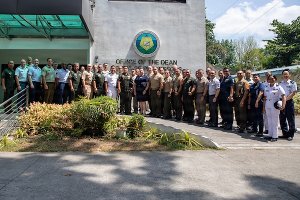 Senior enlisted leaders from the Armed Forces of the Philippines, United States, Canada, New Zealand, France, the U.S. Space Force, the Japan Self-Defense Forces and Australia pose for a group photo during the Balikatan Senior Enlisted Symposium as part of Exercise Balikatan 2026 at Camp General Emilio Aguinaldo, Quezon City, Philippines, April 25, 2026.