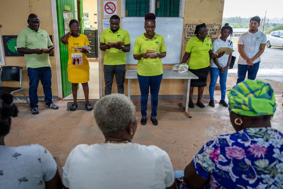 Surinamese healthcare professionals begin the workday with a morning ritual and songs at Medische Zending Primary Health Care Center in Brownsweg, Suriname, April 15, 2026. LAMAT 2026 strengthens collaboration between U.S. Air Force medical teams and Ministry of Health providers across medical facilities in Suriname. (U.S. Air Force photo by Staff Sgt. Joshua Hastings)