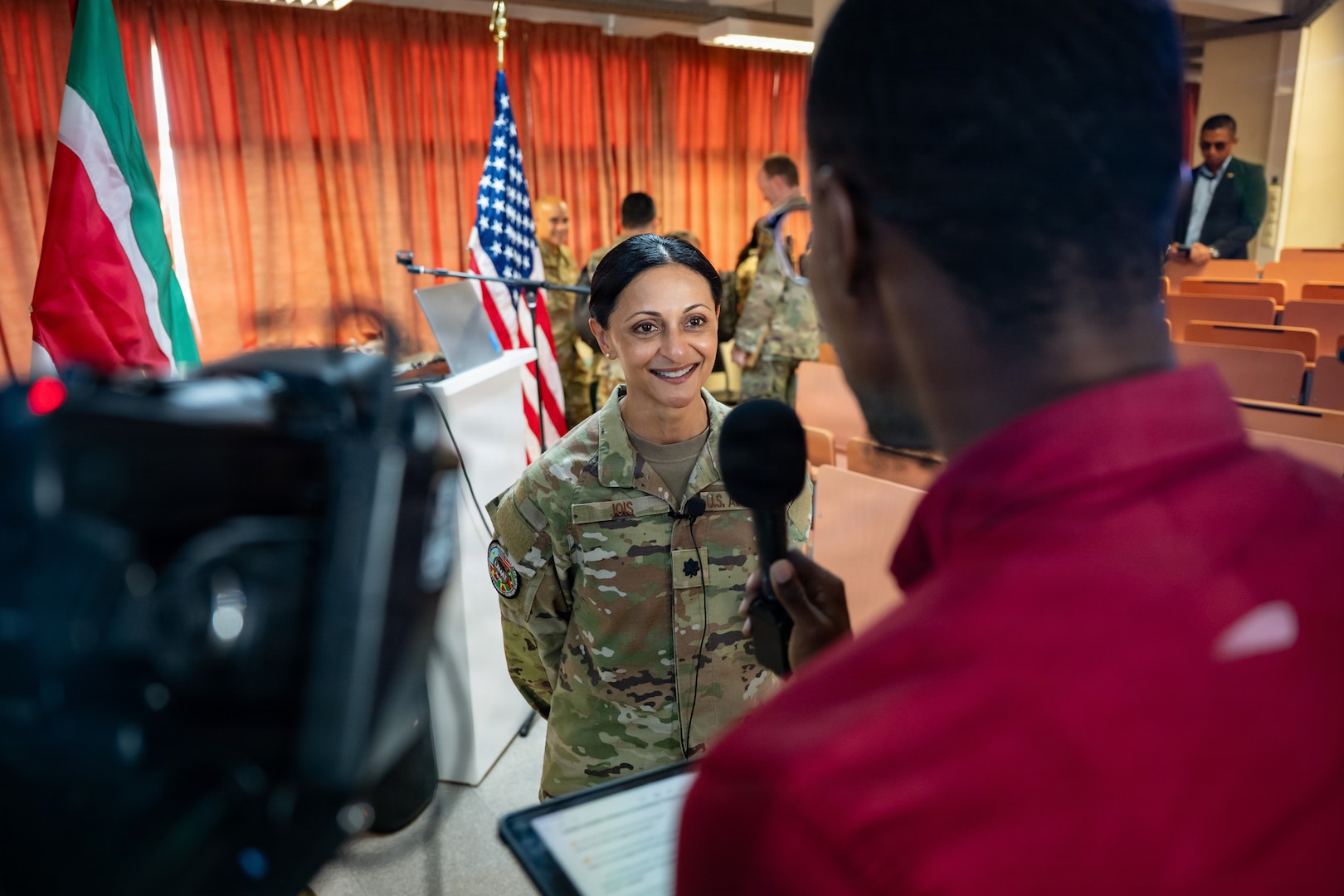 U.S. Air Force Lt. Col. Preeti Jois, Lesser Antilles Medical Assistance Team (LAMAT) 2026 mission commander, answers questions from the media after the closing ceremony of the LAMAT 2026 mission in Paramaribo, Suriname, April 23, 2026. The ceremony marked the end of the medical engagement, which was a collaborative effort to share knowledge, enhance readiness and strengthen critical relationships between U.S. and Surinamese practitioners. (U.S. Air Force photo by Staff. Sgt. Madeline Herzog)