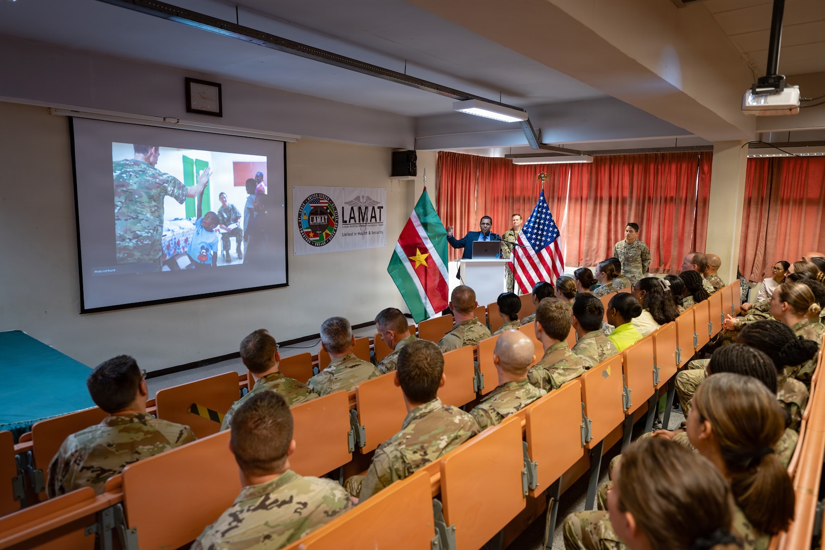 Dr. Rakesh Sukul, Ministry of Health director, speaks during the closing ceremony of the Lesser Antilles Medical Assistance Team (LAMAT) 2026 mission in Paramaribo, Suriname, April 23, 2026. The ceremony was a two week culmination of integration, coordination and cooperation between U.S. and host nation medical teams, with a focus on delivering critical care at different sites across the country while strengthening relationships and exchanging knowledge. (U.S. Air Force photo by Staff. Sgt. Madeline Herzog)