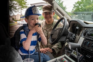 A student holds a radio.