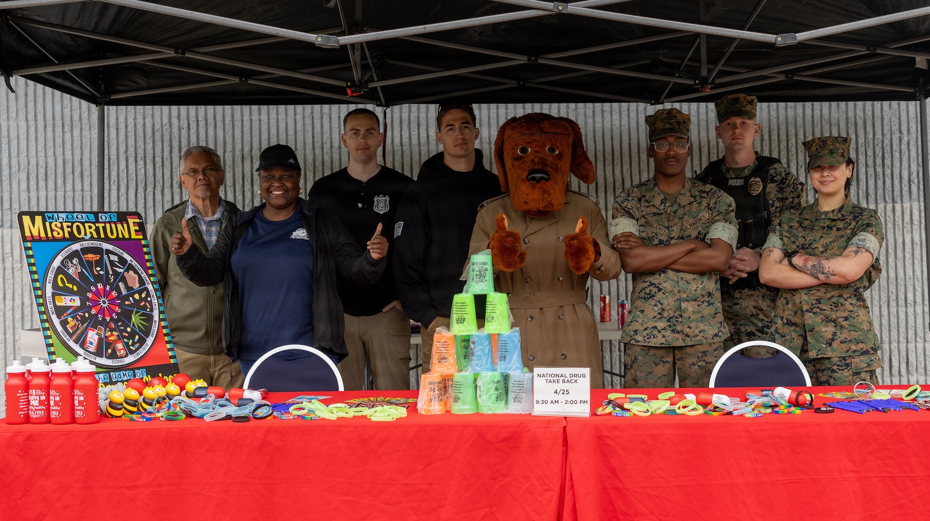U.S. Marines and Volunteers with the Drug Enforcement Administration Drug Take Back Program pose for a photo during the DEA Drug Take Back Program at the Marine Corps Exchange on Marine Corps Base Quantico, Virginia, April 27, 2026. This program is hosted by the DEA to provide a safe, convenient, and responsible means of disposing expired and unused prescription medications. (U.S. Marine Corps photo by Sgt. Chancellor Reynolds)
