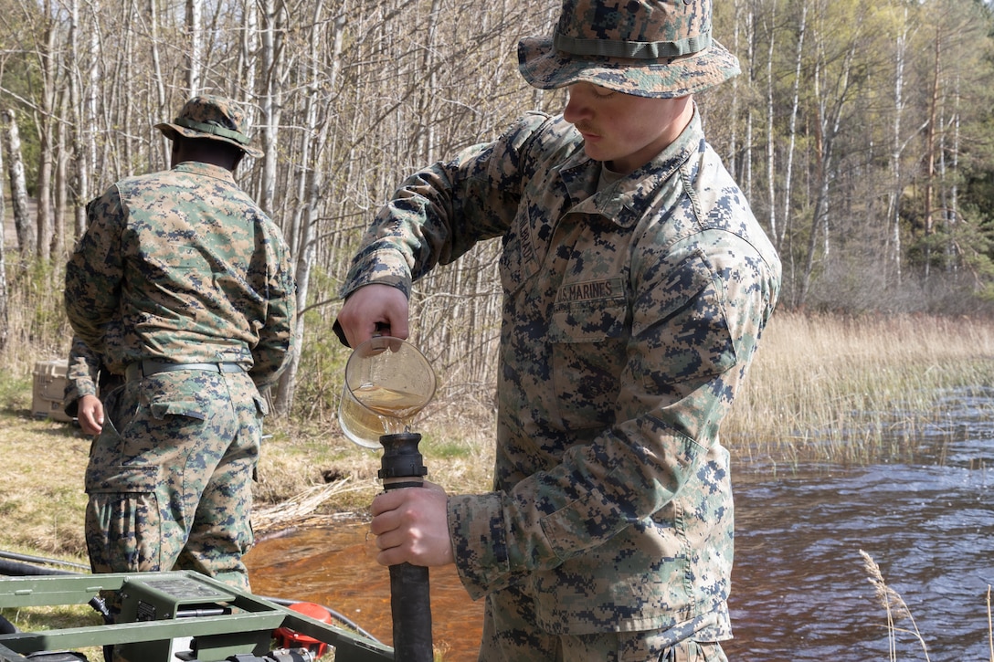 U.S. Marine Corps Lance Cpl. Cooper Milbradt, a water support technician with Combat Logistics Battalion 24, Combat Logistics Regiment 27, 2nd Marine Logistics Group, primes water pipes with unfiltered water during exercise Aurora 26 in Kvarn, Sweden, April 26, 2026. Marines use portable, rugged, and energy‑efficient water purification systems to provide safe drinking water in austere or combat environments. U.S. Marines and Sailors with 2nd MLG are participating in exercise Aurora as part of the larger U.S. Army-led Sword 26 series of linked multinational exercises, which directly supports NATO's Eastern Flank Deterrence Initiative concept, validates defense plans, builds a unified lethal force, and strengthens deterrence. Milbradt is a native of Minnesota. (U.S. Marine Corps photo by Lance Cpl. Talan Werner)