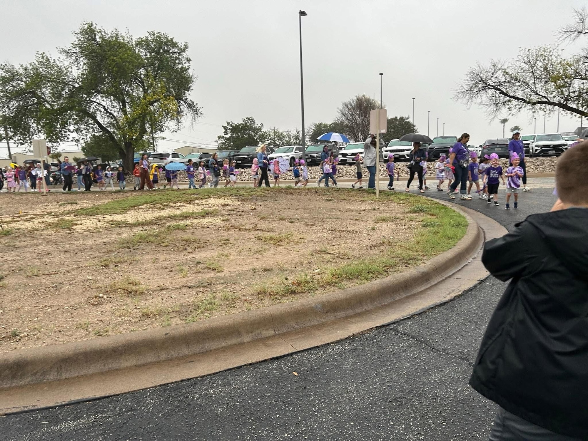 Students and faculty from Roberto “Bobby” Barrera Elementary STEM School marches during the Purple Parade at Laughlin Air Force Base, Texas, April 15, 2026. RBB Elementary celebrated Month of the Military child with various events and themed days throughout the month of April. (Courtesy photo)