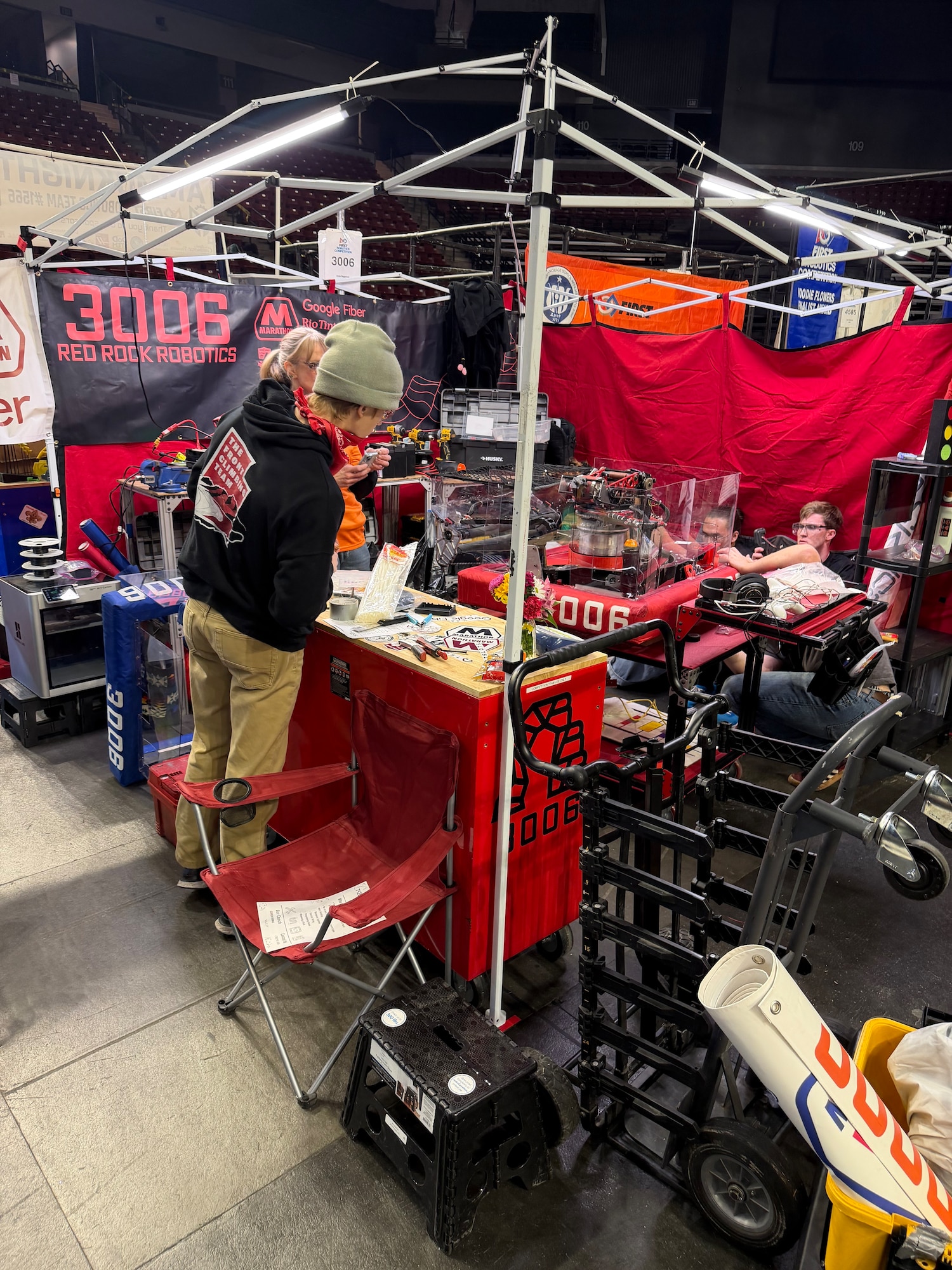 Members of the Red Rock Robotics from West High School work on their robots during the 2026 FIRST Robotics Competition Utah Regional competition. The team won the regional championship. (Courtesy photo)