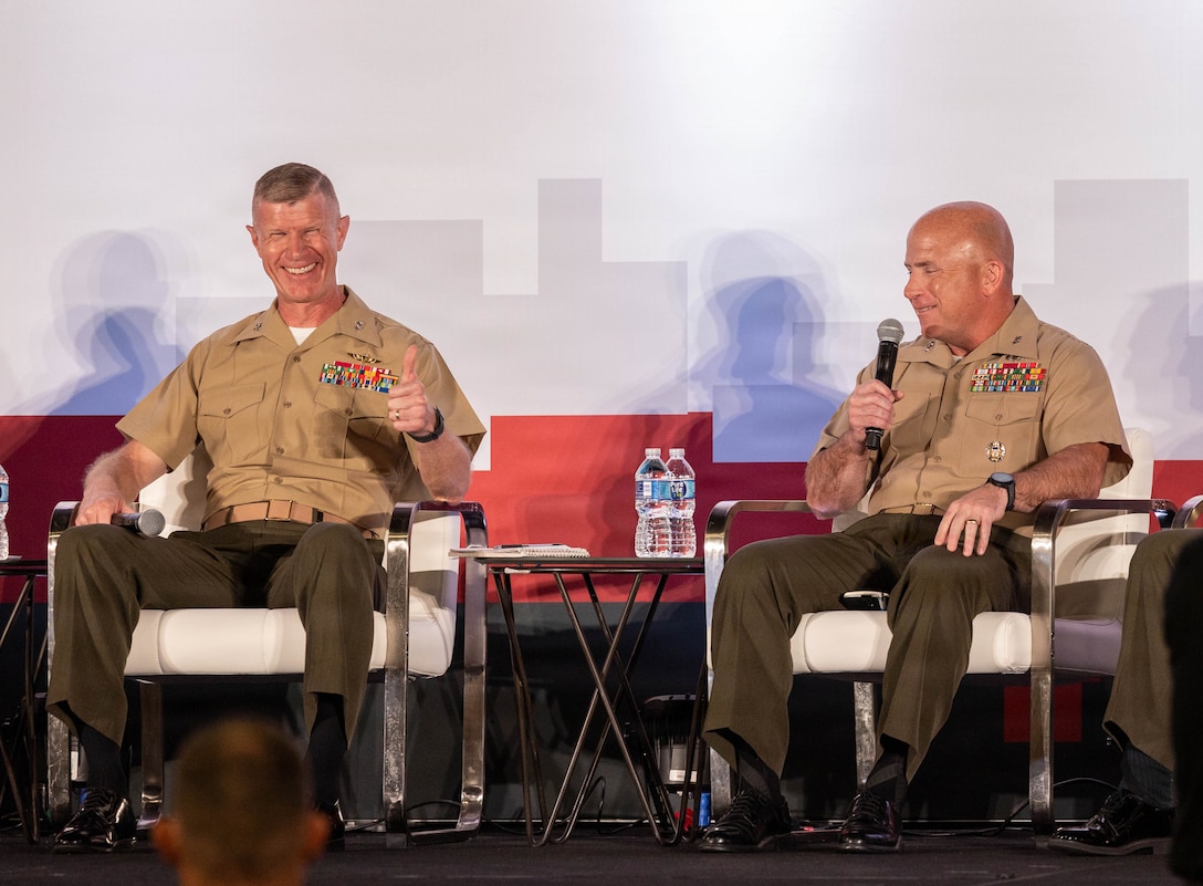 U.S. Marine Corps Maj. Gen. John Jarrard, left, and Maj. Gen Farrell Sullivan of 2nd Marine Division, gives a speech during Modern Day Marine 2026, Walter E. Washington
Convention Center, Washington, DC, April 29, 2026. Modern Day Marine brings
together representatives from military, industry and government to collaborate in
shaping the future of the United States Marine Corps. Through the interactions taking
place at Modern Day Marine, the Corps is able to engage, educate and increase
understanding of the Marine Corps' contributions to the National Defense Strategy.
(U.S. Marine Corps photo by Cpl. Carlina Holland)