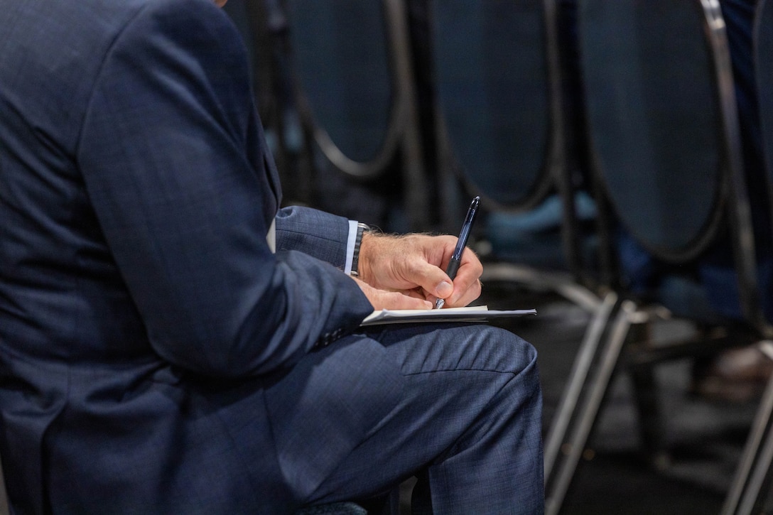 An audience member takes notes during the Ground Combat Element speech at the Modern Day Marine 2026, Walter E. Washington Convention Center, Washington, DC, April 29, 2026. Modern Day Marine brings together representatives from military, industry and government to collaborate in shaping the future of the United States Marine Corps. Through the interactions taking place at Modern Day Marine, the Corps is able to engage, educate and increase
understanding of the Marine Corps' contributions to the National Defense Strategy.
(U.S. Marine Corps photo by Cpl. Carlina Holland)
