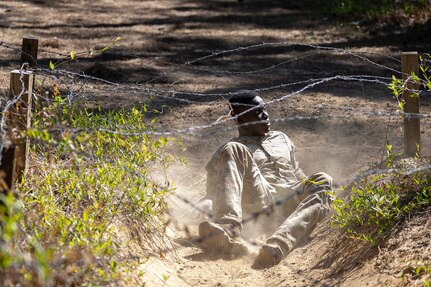 Sgt. Boris Ilboudo, 125th Finance Battalion early entry team certifier, completes an obstacle course on Fort Jackson, S.C., April 20, 2026. Twelve finance and comptroller Soldiers took part in the obstacle course on the first day of the U.S. Army Finance Corps’ annual Finance Soldier of the Year competition. (U.S. Army photo by 1st Lt. Maria Rozo)
