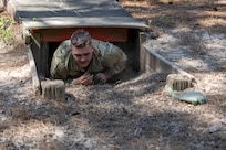 Spc. Jonah Costley, 106th Finance Battalion cashier, completes an obstacle course on Fort Jackson, S.C., April 20, 2026. Twelve finance and comptroller Soldiers took part in the obstacle course on the first day of the U.S. Army Finance Corps’ annual Finance Soldier of the Year competition. (U.S. Army photo by Mark R. W. Orders-Woempner)
