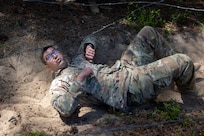 1st Lt. Lucas Tucker, 106th Finance Battalion Bravo Company executive officer, completes an obstacle course on Fort Jackson, S.C., April 20, 2026. Twelve finance and comptroller Soldiers took part in the obstacle course on the first day of the U.S. Army Finance Corps’ annual Finance Soldier of the Year competition. (U.S. Army photo by Mark R. W. Orders-Woempner)