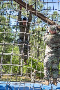 Spc. Erick Bedoya, 15th Finance Battalion financial management technician, completes an obstacle course on Fort Jackson, S.C., April 20, 2026. Twelve finance and comptroller Soldiers took part in the obstacle course on the first day of the U.S. Army Finance Corps’ annual Finance Soldier of the Year competition. (U.S. Army photo by 1st Lt. Maria Rozo)