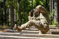 Capt. Terry Montgomery, 15th Finance Battalion finance officer, completes an obstacle course on Fort Jackson, S.C., April 20, 2026. Twelve finance and comptroller Soldiers took part in the obstacle course on the first day of the U.S. Army Finance Corps’ annual Finance Soldier of the Year competition. (U.S. Army photo by Mark R. W. Orders-Woempner)