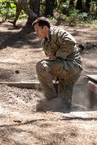 Staff Sgt. Brandon Comninos, 18th Finance Battalion financial management analyst, completes an obstacle course on Fort Jackson, S.C., April 20, 2026. Twelve finance and comptroller Soldiers took part in the obstacle course on the first day of the U.S. Army Finance Corps’ annual Finance Soldier of the Year competition. (U.S. Army photo by Mark R. W. Orders-Woempner)