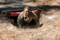 Capt. Bethani Glover-Greaves, 18th Finance Battalion Alpha Company commander, completes an obstacle course on Fort Jackson, S.C., April 20, 2026. Twelve finance and comptroller Soldiers took part in the obstacle course on the first day of the U.S. Army Finance Corps’ annual Finance Soldier of the Year competition. (U.S. Army photo by Mark R. W. Orders-Woempner)