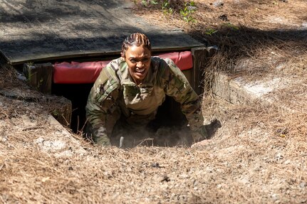 Capt. Bethani Glover-Greaves, 18th Finance Battalion Alpha Company commander, completes an obstacle course on Fort Jackson, S.C., April 20, 2026. Twelve finance and comptroller Soldiers took part in the obstacle course on the first day of the U.S. Army Finance Corps’ annual Finance Soldier of the Year competition. (U.S. Army photo by Mark R. W. Orders-Woempner)
