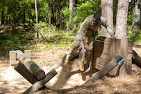2nd Lt. Aquoi Alexander, 125th Finance Battalion Bravo Company platoon leader, completes an obstacle course on Fort Jackson, S.C., April 20, 2026. Twelve finance and comptroller Soldiers took part in the obstacle course on the first day of the U.S. Army Finance Corps’ annual Finance Soldier of the Year competition. (U.S. Army photo by Mark R. W. Orders-Woempner)