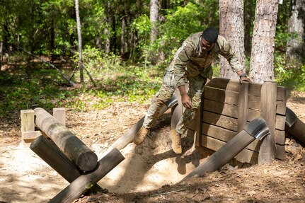 2nd Lt. Aquoi Alexander, 125th Finance Battalion Bravo Company platoon leader, completes an obstacle course on Fort Jackson, S.C., April 20, 2026. Twelve finance and comptroller Soldiers took part in the obstacle course on the first day of the U.S. Army Finance Corps’ annual Finance Soldier of the Year competition. (U.S. Army photo by Mark R. W. Orders-Woempner)