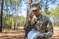 Pvt. 1st Class Zhiyi Wang, 18th Finance Battalion Bravo Company cashier, takes part in a land navigation exercise at the Mekong Delta day land navigation course on Fort Jackson, S.C., April 20, 2026. Twelve finance and comptroller Soldiers took part in the land navigation course on the first day of the U.S. Army Finance Corps’ annual Finance Soldier of the Year competition. (U.S. Army photo by Mark R. W. Orders-Woempner)