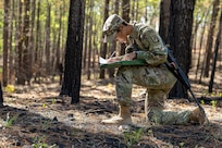 Capt. Bethani Glover-Greaves, 18th Finance Battalion Alpha Company commander, takes part in a land navigation exercise at the Mekong Delta day land navigation course on Fort Jackson, S.C., April 20, 2026. Twelve finance and comptroller Soldiers took part in the land navigation course on the first day of the U.S. Army Finance Corps’ annual Finance Soldier of the Year competition. (U.S. Army photo by Mark R. W. Orders-Woempner)