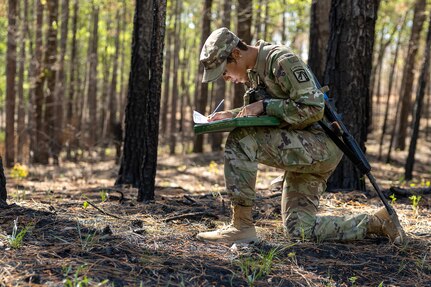 Capt. Bethani Glover-Greaves, 18th Finance Battalion Alpha Company commander, takes part in a land navigation exercise at the Mekong Delta day land navigation course on Fort Jackson, S.C., April 20, 2026. Twelve finance and comptroller Soldiers took part in the land navigation course on the first day of the U.S. Army Finance Corps’ annual Finance Soldier of the Year competition. (U.S. Army photo by Mark R. W. Orders-Woempner)