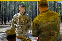 Pvt. 1st Class Zhiyi Wang, 18th Finance Battalion Bravo Company cashier, completes a land navigation exercise at the Mekong Delta day land navigation course on Fort Jackson, S.C., April 20, 2026. Twelve finance and comptroller Soldiers took part in the land navigation course on the first day of the U.S. Army Finance Corps’ annual Finance Soldier of the Year competition. (U.S. Army photo by Mark R. W. Orders-Woempner)