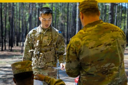 Pvt. 1st Class Zhiyi Wang, 18th Finance Battalion Bravo Company cashier, completes a land navigation exercise at the Mekong Delta day land navigation course on Fort Jackson, S.C., April 20, 2026. Twelve finance and comptroller Soldiers took part in the land navigation course on the first day of the U.S. Army Finance Corps’ annual Finance Soldier of the Year competition. (U.S. Army photo by Mark R. W. Orders-Woempner)