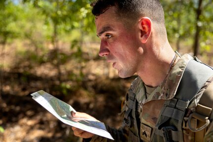 Cpl. Hunter Pressley, 15th Finance Battalion financial management technician, takes part in a land navigation exercise at the Mekong Delta day land navigation course on Fort Jackson, S.C., April 20, 2026. Twelve finance and comptroller Soldiers took part in the land navigation course on the first day of the U.S. Army Finance Corps’ annual Finance Soldier of the Year competition. (U.S. Army photo by Mark R. W. Orders-Woempner)
