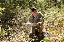 Cpl. Hunter Pressley, 15th Finance Battalion financial management technician, takes part in a land navigation exercise at the Mekong Delta day land navigation course on Fort Jackson, S.C., April 20, 2026. Twelve finance and comptroller Soldiers took part in the land navigation course on the first day of the U.S. Army Finance Corps’ annual Finance Soldier of the Year competition. (U.S. Army photo by Mark R. W. Orders-Woempner)
