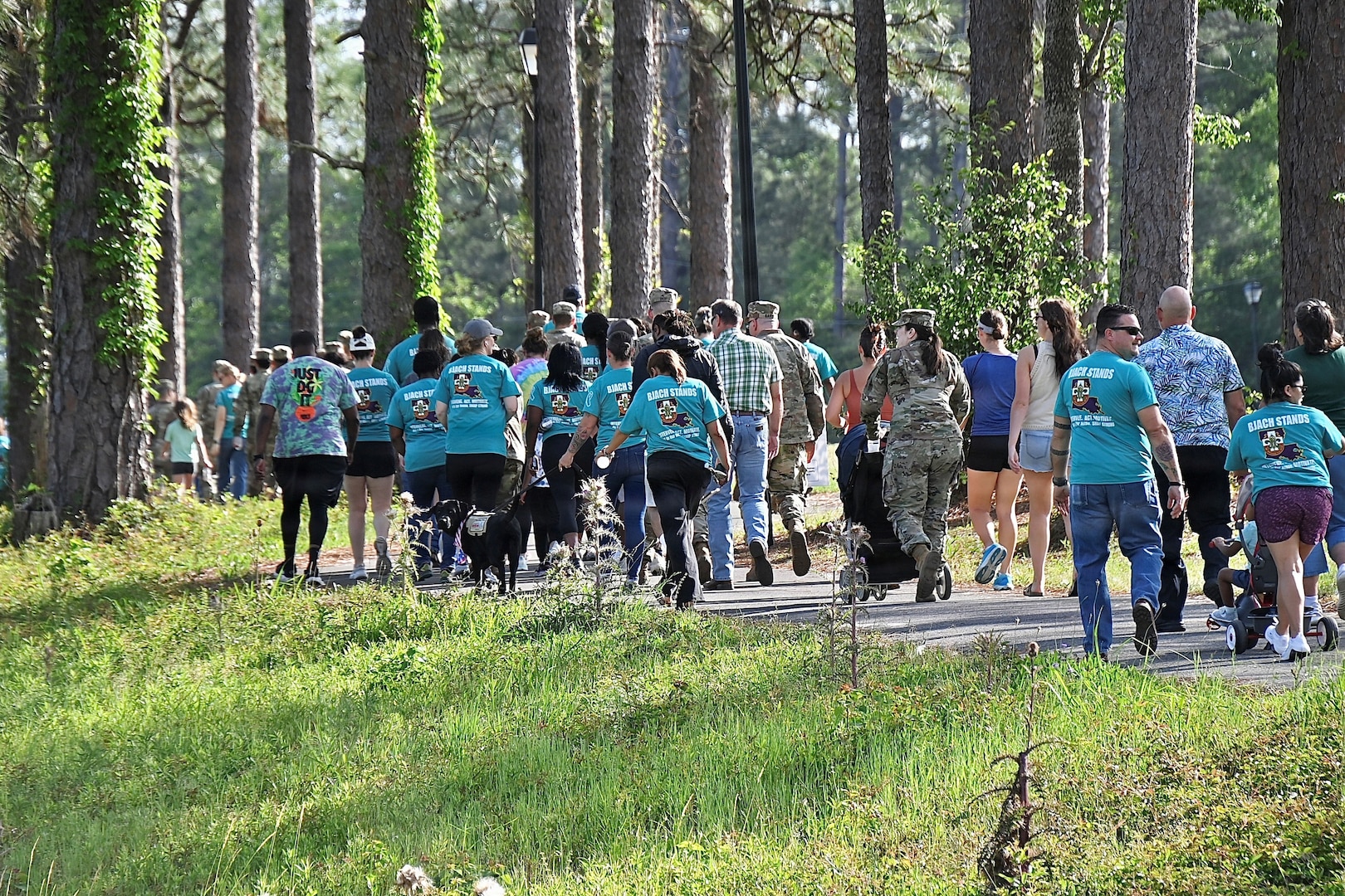 Bayne-Jones Army Community Hospital Employees take part in a community walk for sexual prevention and awareness.