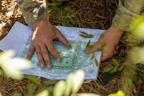 Cpl. Hunter Pressley, 15th Finance Battalion financial management technician, takes part in a land navigation exercise at the Mekong Delta day land navigation course on Fort Jackson, S.C., April 20, 2026. Twelve finance and comptroller Soldiers took part in the land navigation course on the first day of the U.S. Army Finance Corps’ annual Finance Soldier of the Year competition. (U.S. Army photo by Mark R. W. Orders-Woempner)