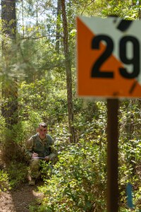 Cpl. Hunter Pressley, 15th Finance Battalion financial management technician, takes part in a land navigation exercise at the Mekong Delta day land navigation course on Fort Jackson, S.C., April 20, 2026. Twelve finance and comptroller Soldiers took part in the land navigation course on the first day of the U.S. Army Finance Corps’ annual Finance Soldier of the Year competition. (U.S. Army photo by Mark R. W. Orders-Woempner)