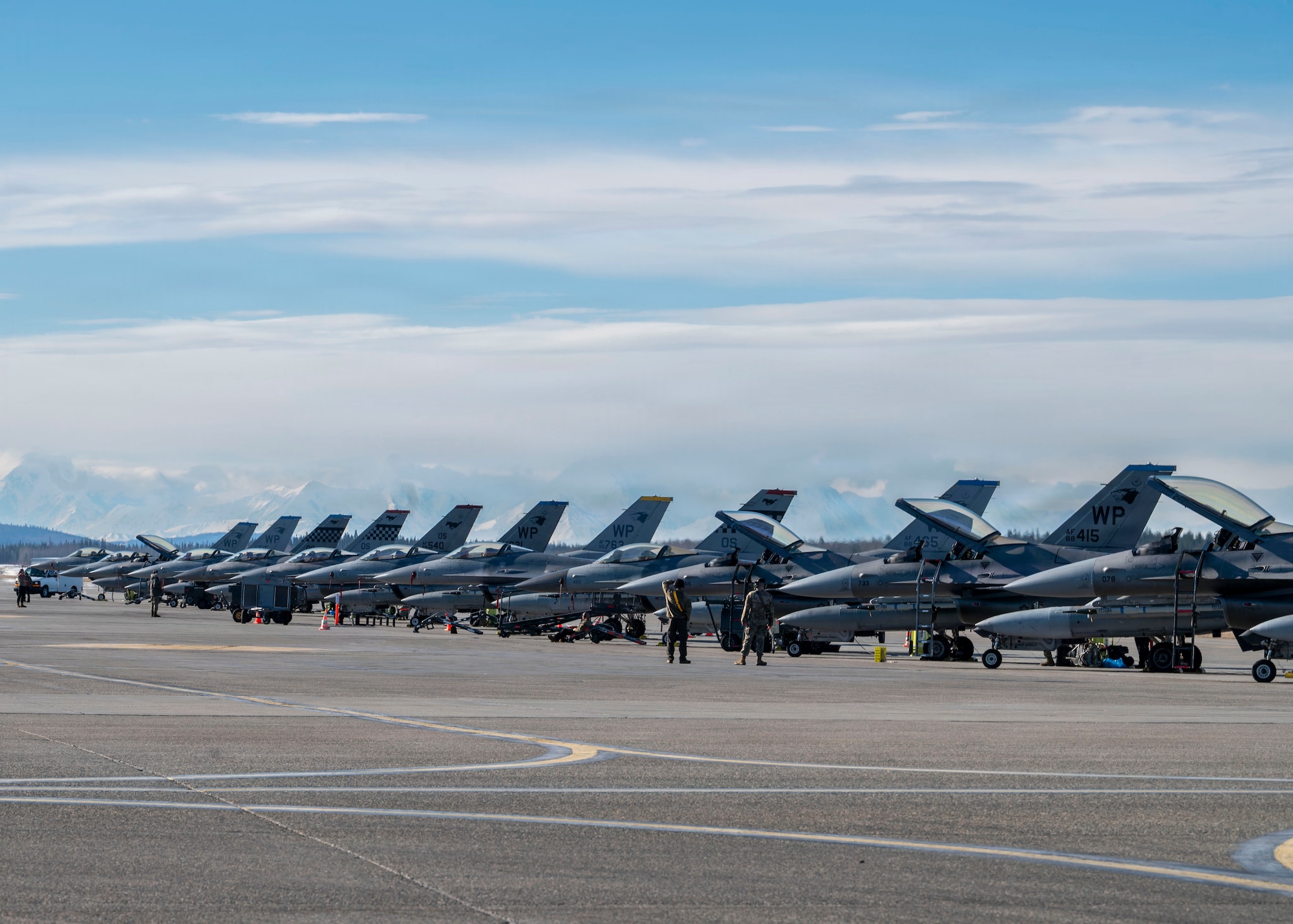U.S. Air Force maintainers go through preflight checks on F-16 Fighting Falcons before taking off during RED FLAG-Alaska 26-1 at Eielson Air Force Base, Alaska, April 20, 2026.