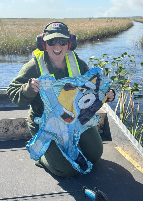 Megan Parsons, acting lead ranger, displays a balloon recovered from Lake Okeechobee, Florida, April 22, 2026. Balloons released into the air often return to waterways, where they contribute to environmental pollution and threaten wildlife. (U.S. Army Corps of Engineers photo)