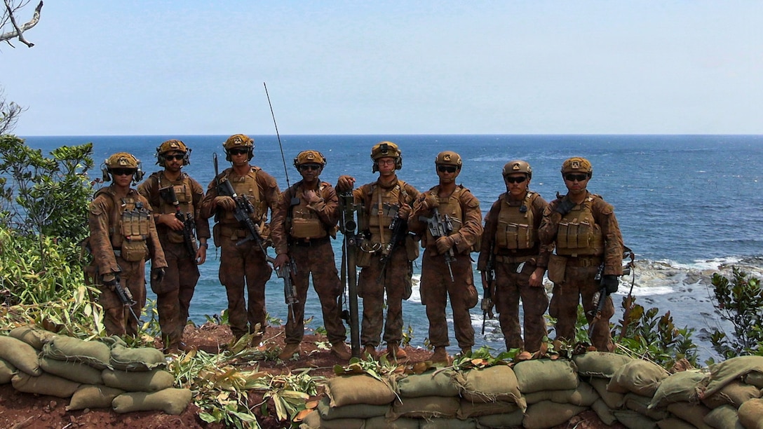 U.S. Marines assigned to 3rd Low Altitude Air Defense Battalion, Marine Rotational Force –Darwin 26, pose for a group photo after a combined live-fire event during Exercise Balikatan 2026 in Aporawan, Palawan, Philippines, April 27, 2026. Balikatan is a longstanding annual exercise between the Armed Forces of the Philippines and U.S. military that represents the strength of our alliance, improves our capable combined force, and demonstrates our commitment to regional peace and prosperity. (U.S. Marine Corps photo by Cpl. Grant Schirmer)
