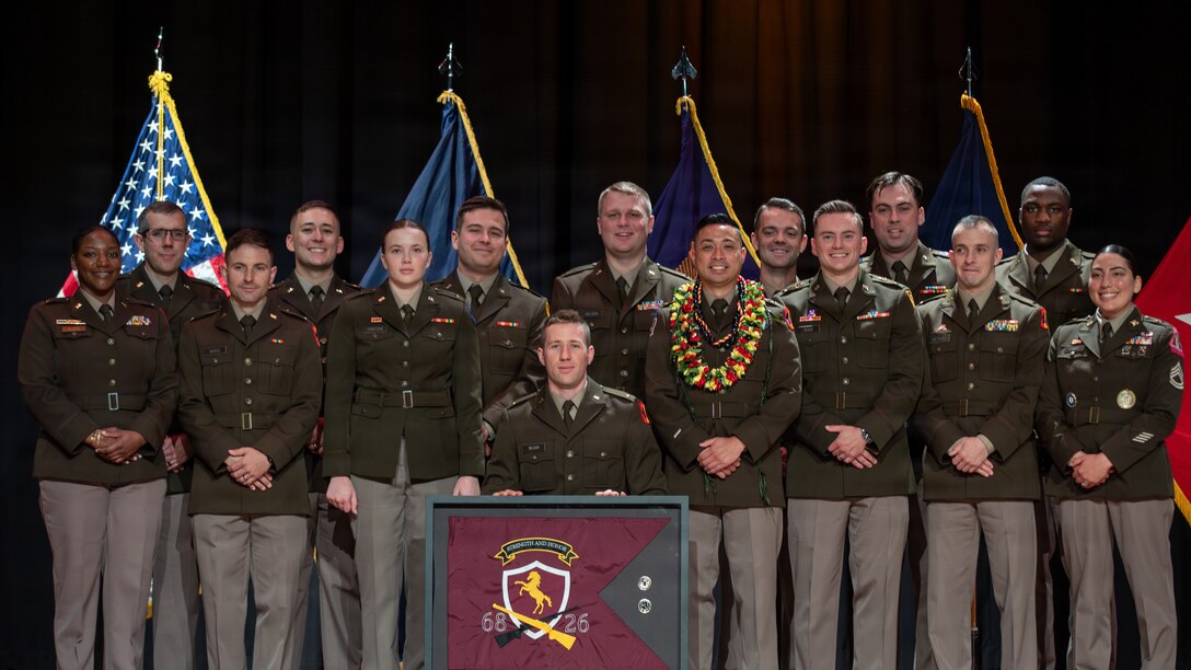 Officer Candidate School Class 68-26 poses for a group photograph following their graduation ceremony at Kentucky State University’s David H. Bradford Hall Auditorium in Frankfort, Kentucky, April 18, 2026.