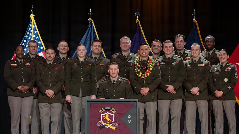 Officer Candidate School Class 68-26 poses for a group photograph following their graduation ceremony at Kentucky State University’s David H. Bradford Hall Auditorium in Frankfort, Kentucky, April 18, 2026.