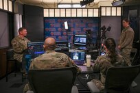 Members of the National Guard Bureau Public Affairs Office conduct livestream operations during the virtual NGB-PA Public Affairs Training Workshop, in Arlington, Va., April 22, 2026.