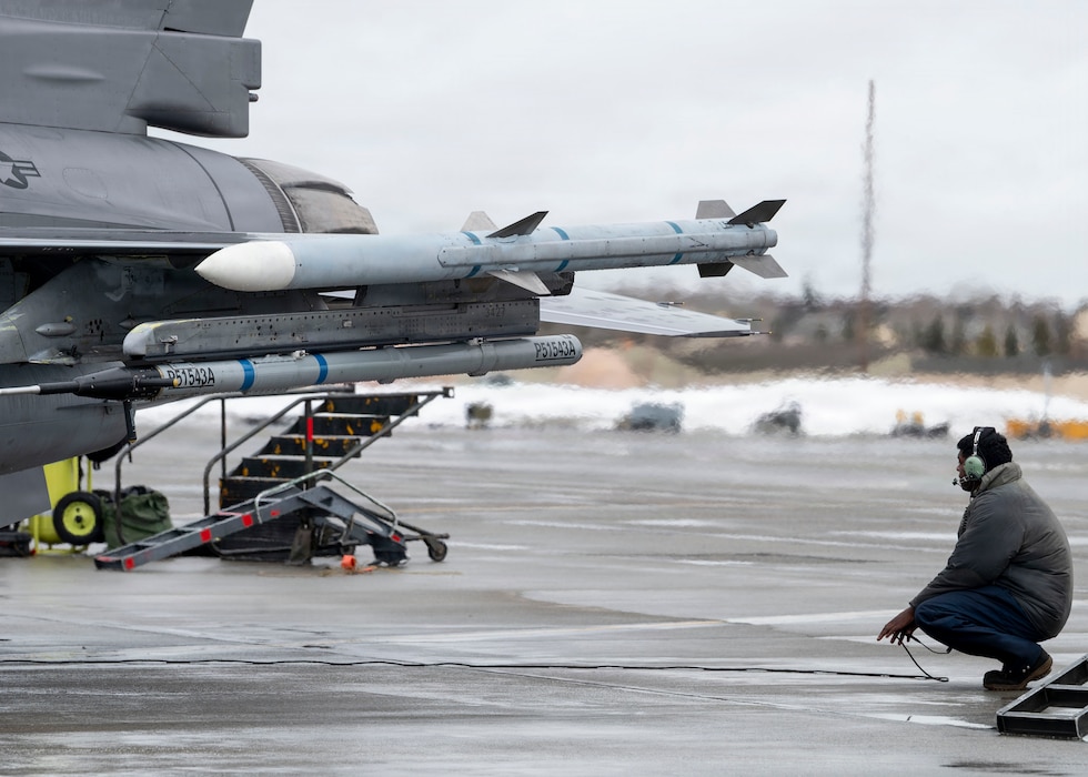 A U.S. Air Force maintainer observes an F-16 Fighting Falcon as part of preflight maintenance checks during RED FLAG-Alaska 26-1 at Eielson Air Force Base, Alaska, April 20, 2026.