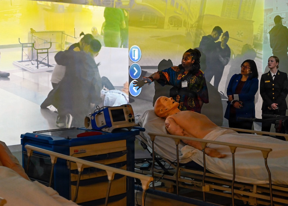 260409-N-IX644-1039 (April 9, 2026) SILVER SPRING, Md. Attendees of the Inaugural Navy Medicine Education Leadership Summit, participate in a demonstration of the Hybrid Lab Immersive Environment at the Val G. Hemming Simulation Center in Silver Spring, Maryland. The summit aims to provide academic leaders with a unique, high-level overview of the strategic challenges and groundbreaking opportunities within Navy Medicine for future military healthcare professionals. The Navy Medicine Enterprise's 44,000+ talented and ready forces optimize health readiness, deliver quality healthcare, and provide global expeditionary medical support to warfighters. (U.S. Navy photo by Mass Communication Specialist 2nd Class Sasha Ambrose)