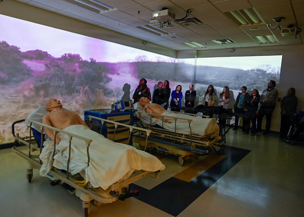 260409-N-IX644-1042 (April 9, 2026) SILVER SPRING, Md. Attendees of the Inaugural Navy Medicine Education Leadership Summit, observe a demonstration of the Hybrid Lab Immersive Environment at the Val G. Hemming Simulation Center in Silver Spring, Maryland. The summit aims to provide academic leaders with a unique, high-level overview of the strategic challenges and groundbreaking opportunities within Navy Medicine for future military healthcare professionals. The Navy Medicine Enterprise's 44,000+ talented and ready forces optimize health readiness, deliver quality healthcare, and provide global expeditionary medical support to warfighters. (U.S. Navy photo by Mass Communication Specialist 2nd Class Sasha Ambrose)