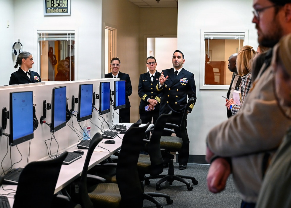 260409-N-IX644-1050 (April 9, 2026) SILVER SPRING, Md. U.S. Navy Cmdr. Orlando Cabrera, center, assigned to the Bureau of Medicine and Surgery (BUMED), asks a question during a tour of the Clinical Skills Lab at the Val G. Hemming Simulation Center during the Inaugural Navy Medicine Education Leadership Summit in Silver Spring, Maryland. The summit aims to provide academic leaders with a unique, high-level overview of the strategic challenges and groundbreaking opportunities within Navy Medicine for future military healthcare professionals. The Navy Medicine Enterprise's 44,000+ talented and ready forces optimize health readiness, deliver quality healthcare, and provide global expeditionary medical support to warfighters. (U.S. Navy photo by Mass Communication Specialist 2nd Class Sasha Ambrose)