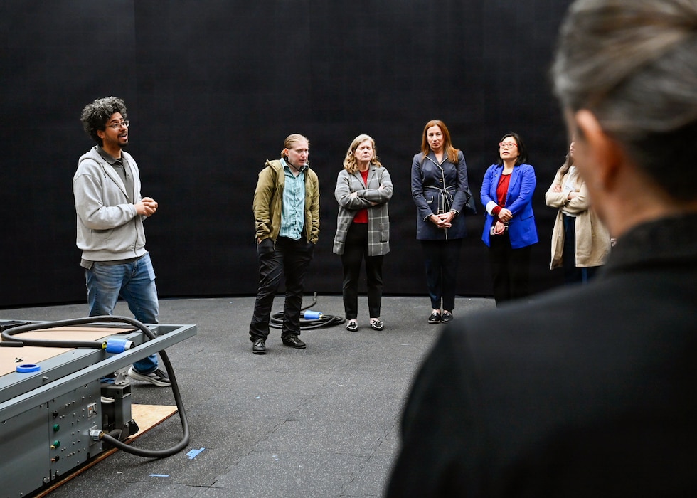 260409-N-IX644-1056 (April 9, 2026) SILVER SPRING, Md. Fernando Reyes, left, a 3-D artist working at the Val G. Hemming Simulation Center, gives a demonstration of the Wide Area Virtual Environment (WAVE), during the Inaugural Navy Medicine Education Leadership Summit in Silver Spring, Maryland. The summit aims to provide academic leaders with a unique, high-level overview of the strategic challenges and groundbreaking opportunities within Navy Medicine for future military healthcare professionals. The Navy Medicine Enterprise's 44,000+ talented and ready forces optimize health readiness, deliver quality healthcare, and provide global expeditionary medical support to warfighters. (U.S. Navy photo by Mass Communication Specialist 2nd Class Sasha Ambrose)
