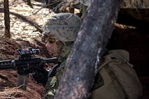 U.S. Marine Corps students with India Company, The Basic School, conduct platoon level tactics building a strong foundation for offense and defense at Marine Corps Base Quantico, Virginia, March 18, 2026. The purpose of the simulated platoon attacks was to introduce Marines to the fundamentals of the offensive and defensive tactics required for provisional rifle platoon commanders. (U.S. Marine Corps photo by Sgt. Myra Walker)