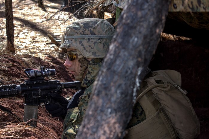 U.S. Marine Corps students with India Company, The Basic School, conduct platoon level tactics building a strong foundation for offense and defense at Marine Corps Base Quantico, Virginia, March 18, 2026. The purpose of the simulated platoon attacks was to introduce Marines to the fundamentals of the offensive and defensive tactics required for provisional rifle platoon commanders. (U.S. Marine Corps photo by Sgt. Myra Walker)