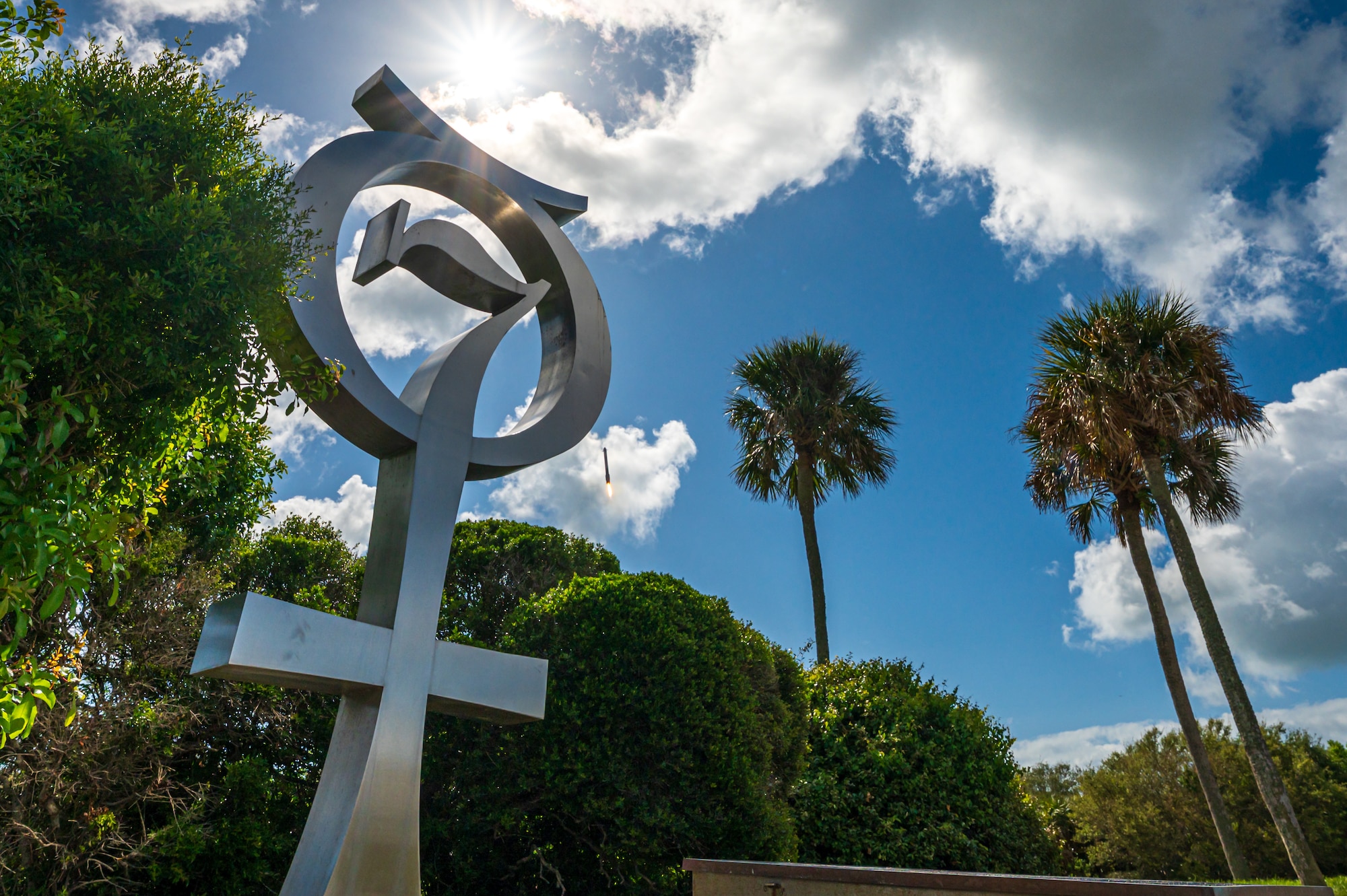 Space Launch Delta 45 and the Eastern Range, a critical component to today’s success, facilitated the Falcon Heavy launch today, April 29, 2026, as the latest success in a record-breaking month. Where Mercury Program vehicles flew once and fell into the ocean, modern reusable rockets now land and fly again. The Mercury 7 memorial at Cape Canaveral Space Force Station marks how far technology has come. This achievement directly advances SLD 45 efforts to expand partnerships and deliver unmatched space access for our nation. (U.S. Space Force photo by Gwendolyn Kurzen)