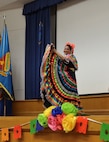 A dancer from Danzantes de San Antonio demonstrates heritage through dance at the Fiesta Showcase at the Defense Language Institute English Language Center in San Antonio, Texas, April 15, 2026. DLIELC is known as the “Gateway to America.” DLIELC builds security cooperation through English language training and cultural immersion for international military partners and pre-basic combat trainees in the U.S. Army and Coast Guard. (U.S. Air Force photo by Agnes Koterba)